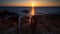 Seascape with stone arch at sunset, Rayong