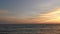Seascape at sunset. Colorful orange sunset on the sea. Atmospheric summer evening