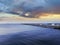 Seascape sunset at sea ,yachting, boat on horizon pier blue cloudy sky nature landscape