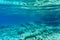 Seascape - transparent and purest blue water of the Aegean Sea. Underwater photography, selective focus.