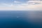 Seascape, view from above.Blue sea and sky with clouds