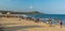Seascape view with group of people,friends,horse riding,mountain background.Rishikonda beach,Visakhapatnam,AP,India,March 05 2017