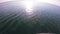 Seascape, view of sea waves with sun reflection from prow of motorboat