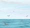 Seascape with water surface,cloudy sky,flying seagulls