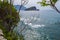 Seascape. Wave and foam. View from a cliff with plants. Adriatic Sea