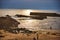 Seascape with waves and rocks, coast of Portugal. Ocean waves crashing on rocks on a bright day