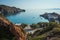 Seascape with white church at Mantrakia on Milos island, Greece