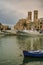 SEASCAPE WINTER.Molfetta harbour: seagull over snow-covered boat..ITALY(Apulia)