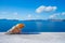 A seashell on a ledge with ocean background, Santorini.