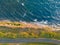 Seashore, cliff and road along the sea on the Paldiski peninsula on a summer day, aerial view