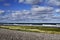 Seashore with clouds and blue sky, Lummelunda, Gotland Island, Sweden.