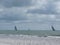 Seashore of Marina di Pisa beach during regatta in a cloudy day at summer. Tuscany, Italy