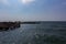 The seashore with the remains of an old jetty