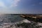 The seashore with the remains of an old jetty