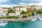 Seashore with road and buildings top view