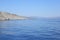Seashore rocky mediterranean landscape waves boat engine