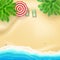 Seashore and sandy beach, flat lay. Top view of sandy beach with summer accessories. Tropical beach, palms, surf waves