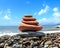 Seashore with stone construction on blue sky background