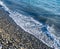 Seashore with stones, pebble closeup, beach