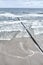 Seaside of Baltic Sea in Poland. Stormy sea, with waves hiting wooden poles. Bird view, aerial view from high up.