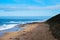 Seaside beach and a cliff