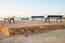 Seaside benches under sunlight