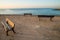 Seaside benches under sunlight