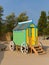 Seaside changing room bath car hut with wooden wheels in yellow and blue