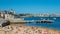 Seaside cityscape of Praia da Ribeira, Cascais. Intimate beach near the train station and popular with tourists