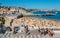 Seaside cityscape of Praia da Ribeira, Cascais. Intimate beach near the train station and popular with tourists