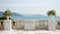 Seaside Elegance: White Marble Podium with Stunning Sea-View Backdrop