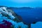 Seaside evening view of Oia and Caldera Santorini Greece