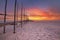 Seaside jetty at sunrise on Texel island, The Netherlands