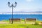 Seaside landscape - benches on the waterfront with sea view