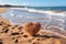 Seaside love Heart etched on beach sand with backdrop of rolling waves