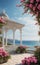 A seaside pavilion graced by delicate pink blossoms offers an expansive vista of the boundless ocean.