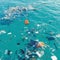 Seaside pollution depicted through floating garbage, highlighting environmental concerns