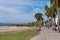 Seaside promenade by Platja de la Llosa beach Cambrils Spain with people walking