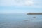 Seaside Serenity: Calm Beach with Pier View