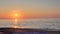 Seaside Sunrise with Calm Water
