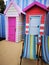 Seaside Surprise.  Cute little beach huts bursting with colour and style. Beachy seaside theme with  striped deck chairs.