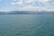 Seaside town of Kalambaka in southern Greece in the summer of 2014. Panorama of the central part and the clean sunny streets of th