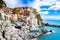 Seaside view of  the coastal village of Manarola,  which is a small village in the Liguria region of Italy known as Cinque Terra