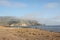 Seaside view - sand, mountain and sea