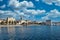 Seaside view of the town of Split, Croatia. Riviera with trees and the old town with the saint dominus cathedral belltower peeking