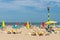 Seaside visitors relaxing in beach chairs at Dutch beach of Scheveningen