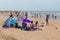 Seaside visitors relaxing at Dutch beach of Scheveningen