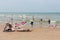 Seaside visitors relaxing at Dutch beach of Scheveningen