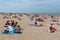 Seaside visitors relaxing at Dutch beach of Scheveningen