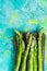 Seasonal asparagus on wooden board